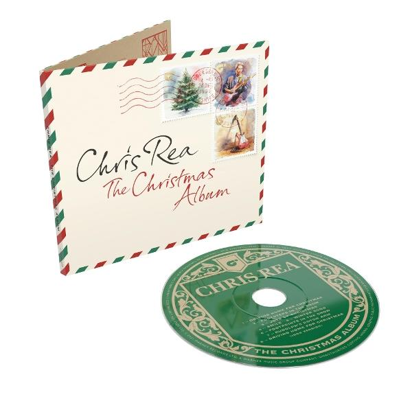 Das Album "Chris Rea: The Christmas Album" ist geöffnet, daneben liegt eine CD. Das Cover ist wie ein Brief gestaltet.