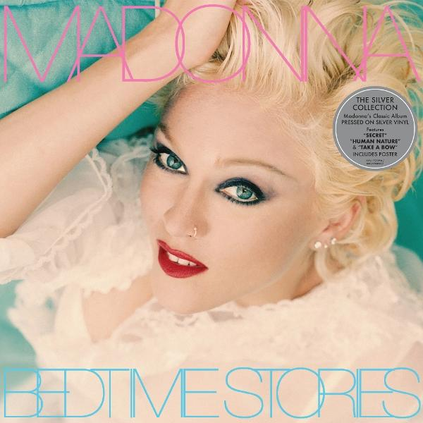 Madonna-Albumcover. Blonde Frau mit roten Lippen, blauen Augen und weißem Kleid. Titel: Bedtime Stories. Enthält den Text: The Silver Collection.