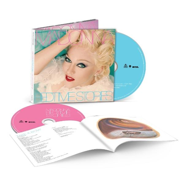 Madonna-Album 'Bedtime Stories' CD. Enthält Jewelcase, pinke und blaue CDs sowie ein Booklet mit Texten und Kunst. Weißer Hintergrund.