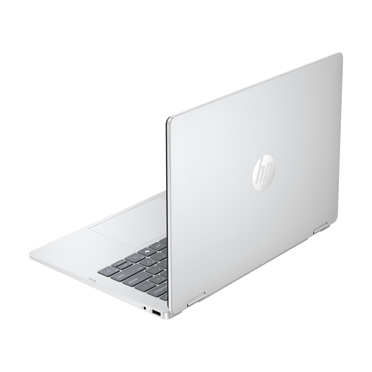 Un laptop HP argentato, leggermente aperto, che mostra la tastiera e il retro con il logo HP. Sfondo bianco.