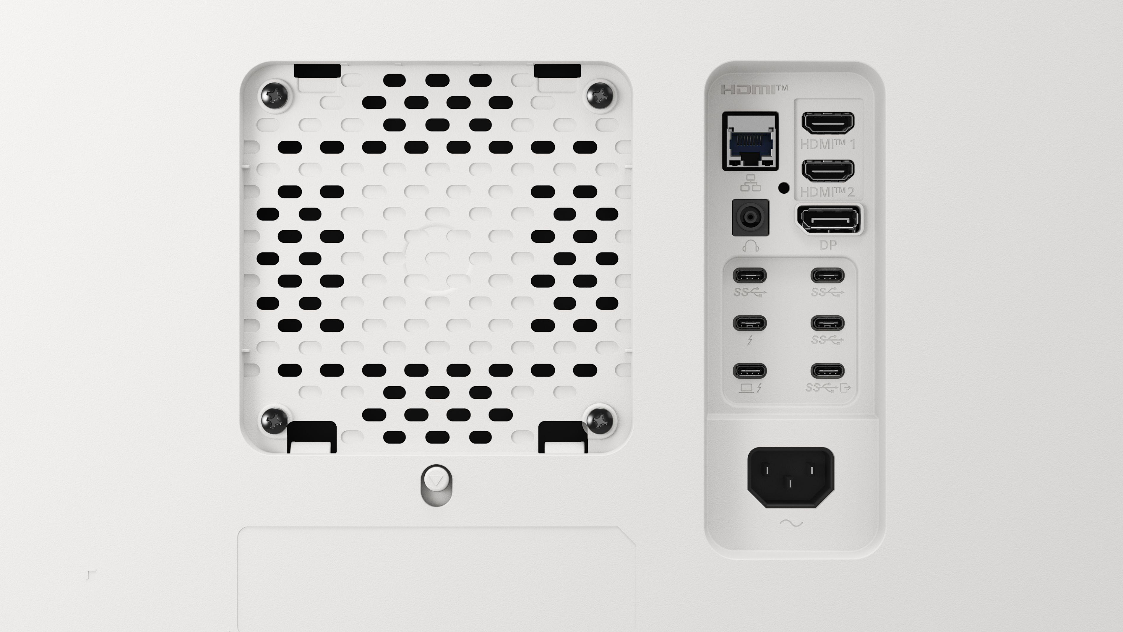 Weiße Computer-Rückseite mit Anschlüssen: HDMI, USB-C, Ethernet, Stromanschluss und Belüftung. Schrauben sichern die Platte.