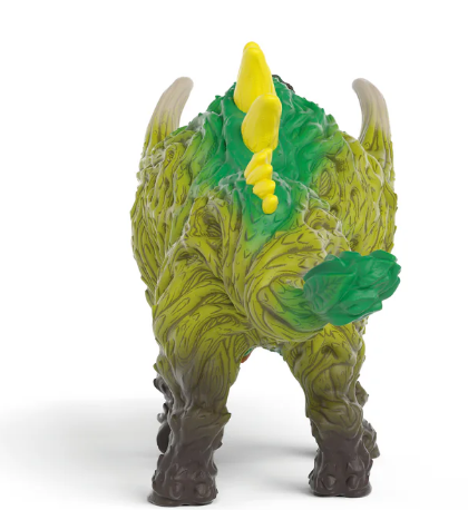 Ein grüner und gelber Spielzeug-Dinosaurier von hinten, sein Körper strukturiert. Der Hintergrund ist weiß.