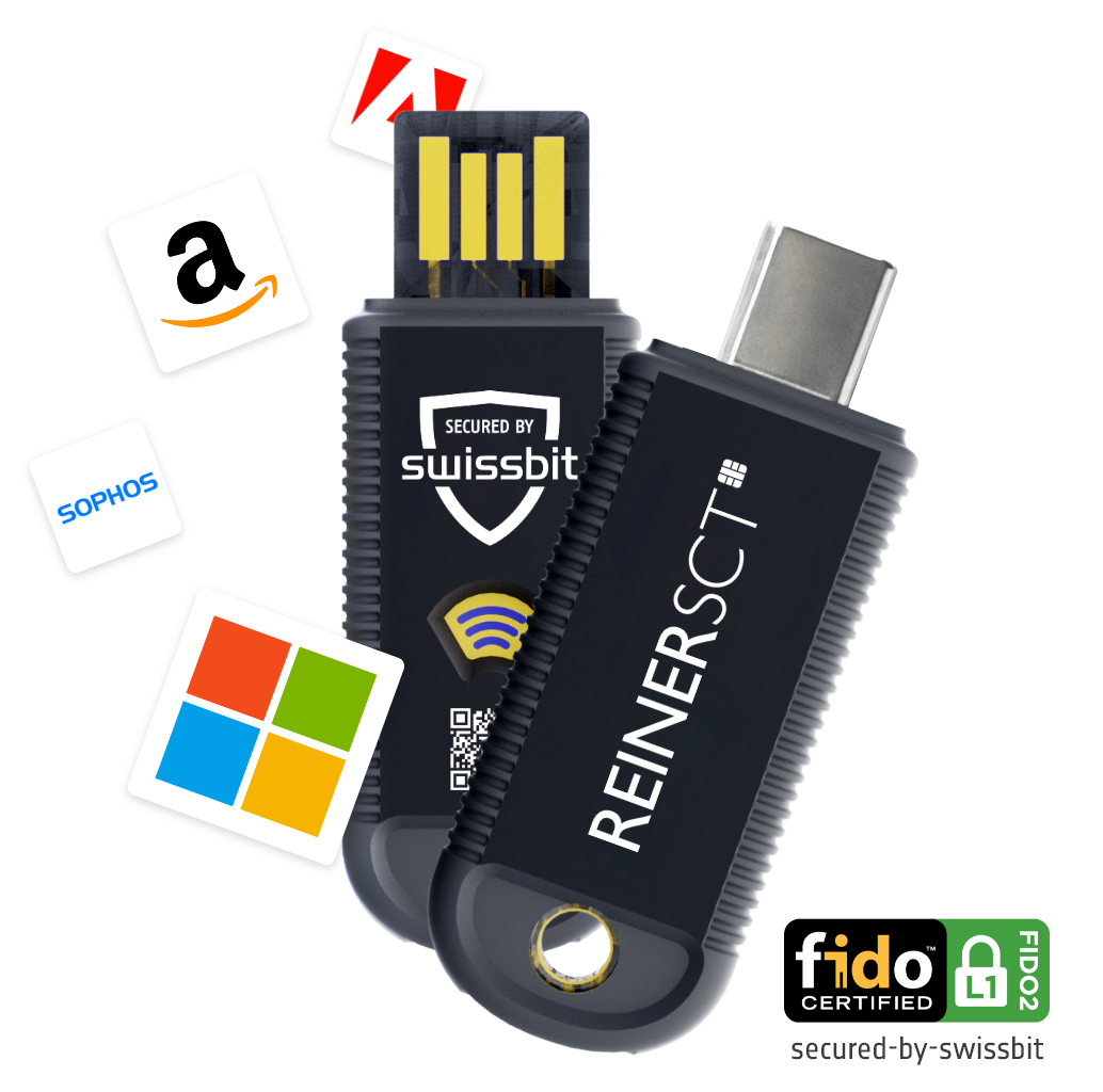 Zwei schwarze USB-Laufwerke mit Logos von Amazon, Microsoft und Sophos. Die Laufwerke tragen die Aufschrift 'swissbit' und 'REINER SCT'.
