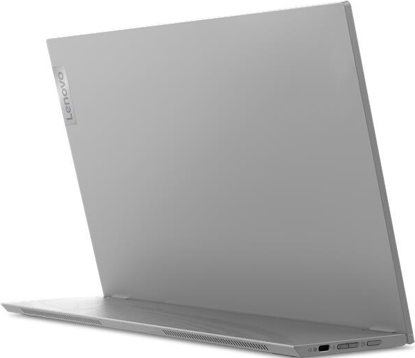 Un laptop Lenovo grigio è aperto, mostra il retro dello schermo e la tastiera. Il logo Lenovo è visibile.