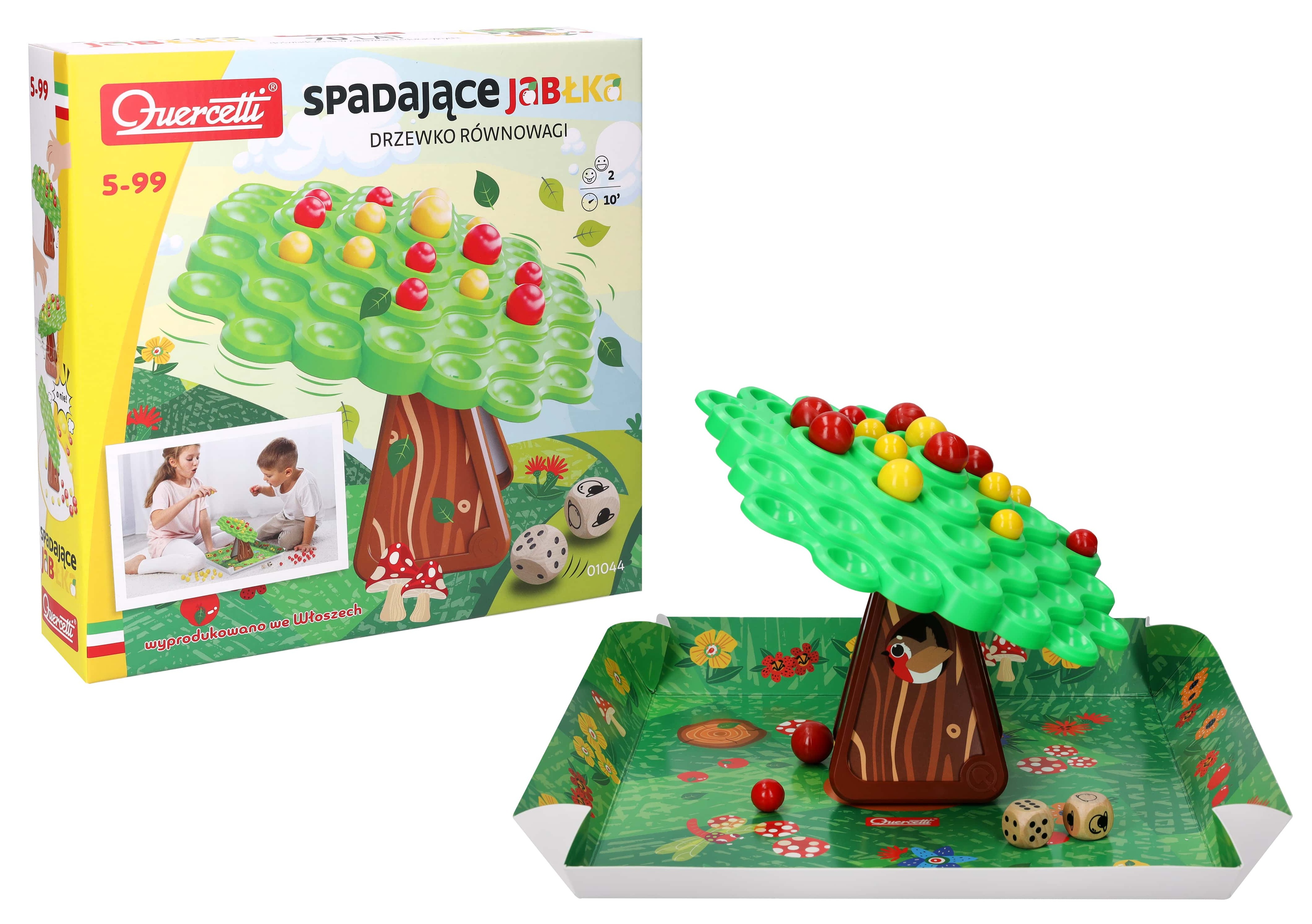 Gra w spadające jabłka. Zielone drzewo z czerwonymi i żółtymi jabłkami, na zielonej podstawie. Pudełko po lewej.
