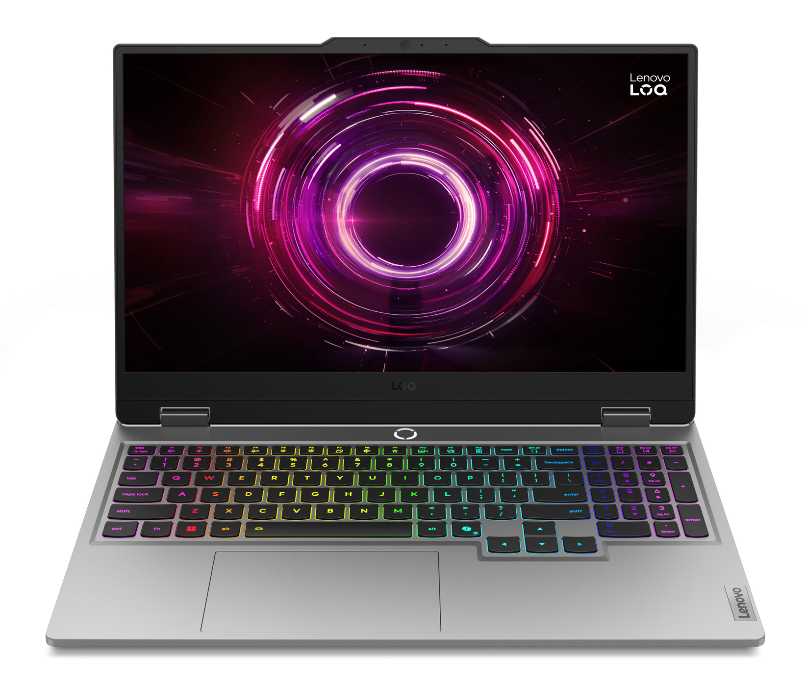 Srebrny laptop z kolorowym ekranem wyświetlającym okrągłe wzory. Klawiatura podświetlana różnymi kolorami. Widoczne logo Lenovo.