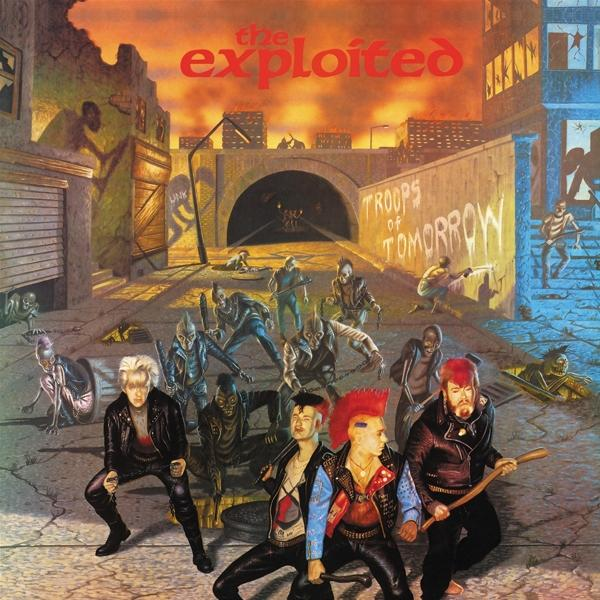 Album borítója. Punk zenekar disztópikus városi jelenetben. 'Troops of Tomorrow' graffiti. Vörös ég, alagút, fegyveres figurák.