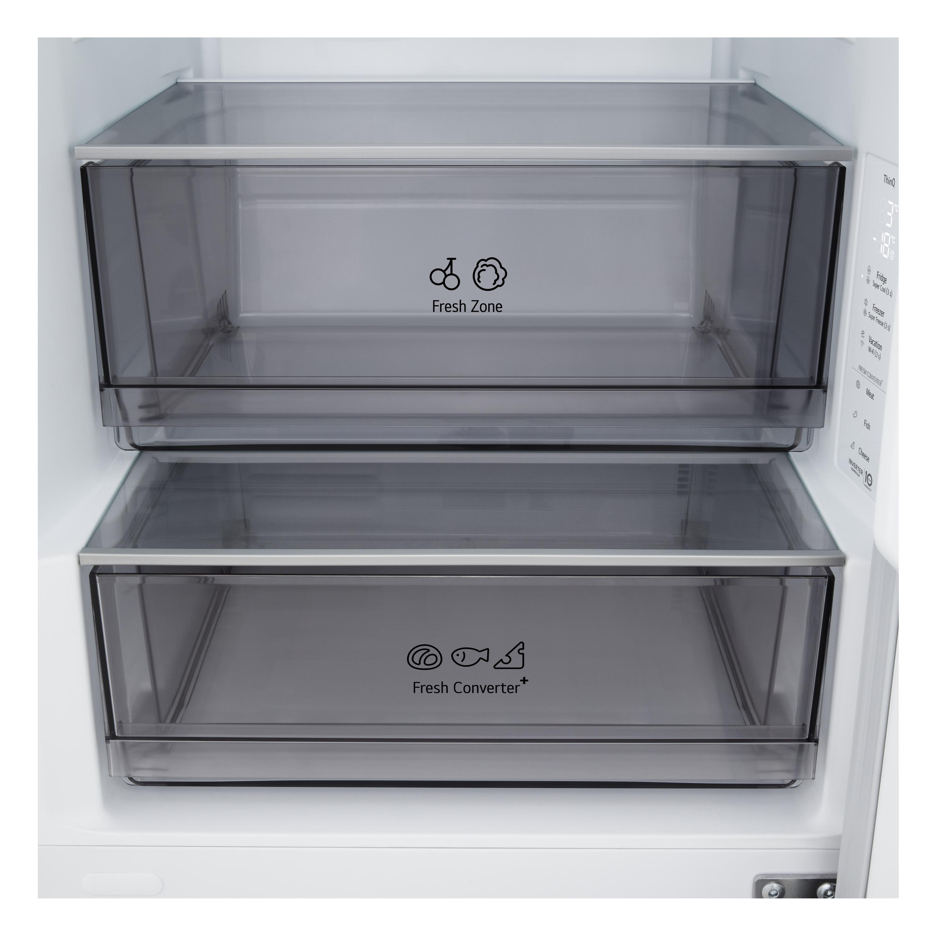 Im Inneren eines Kühlschranks sind zwei transparente Schubladen zu sehen. Auf der oberen steht 'Fresh Zone', auf der unteren 'Fresh Converter+'.