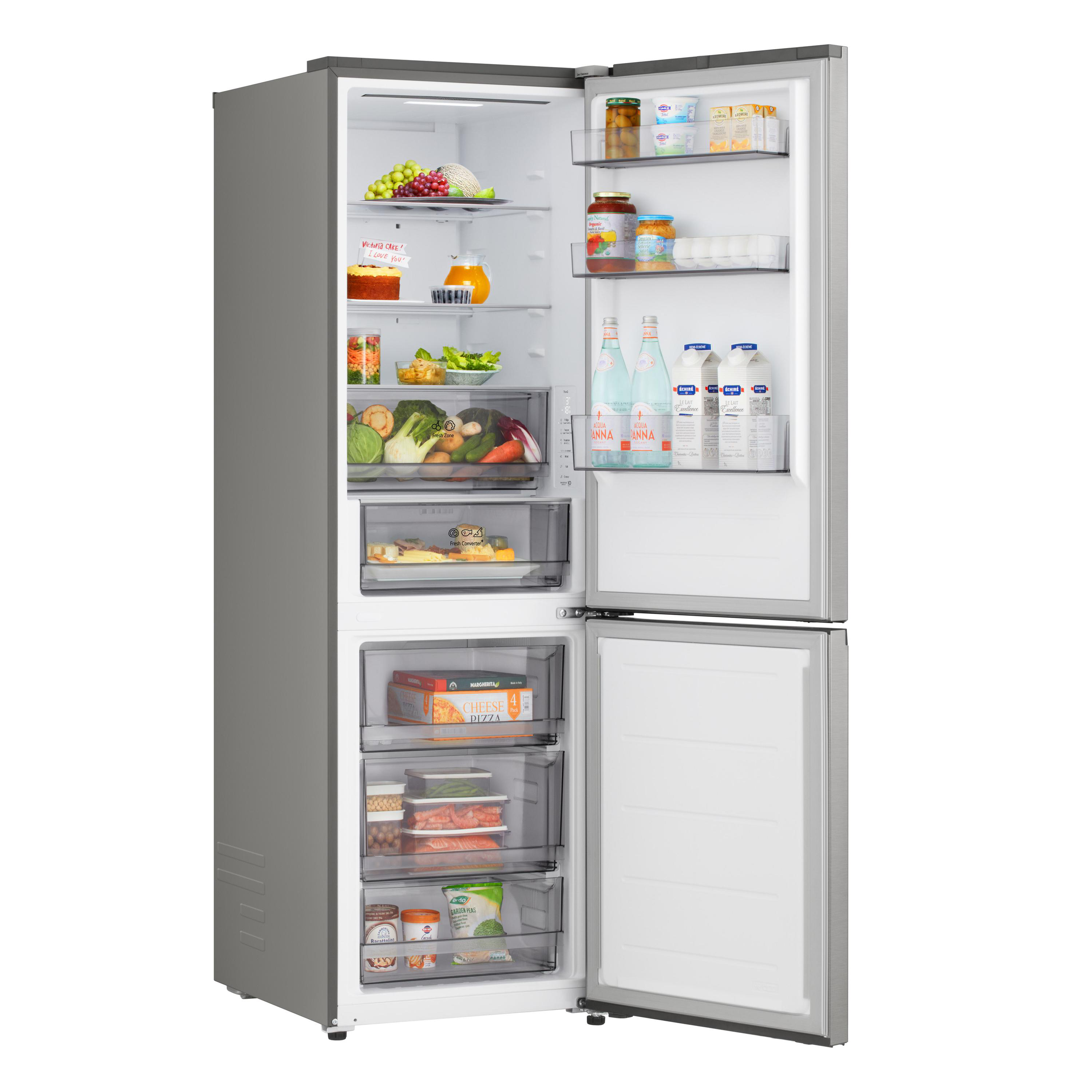 Offener Kühlschrank voller Lebensmittel: Obst, Gemüse, Getränke und Tiefkühlpizzas.