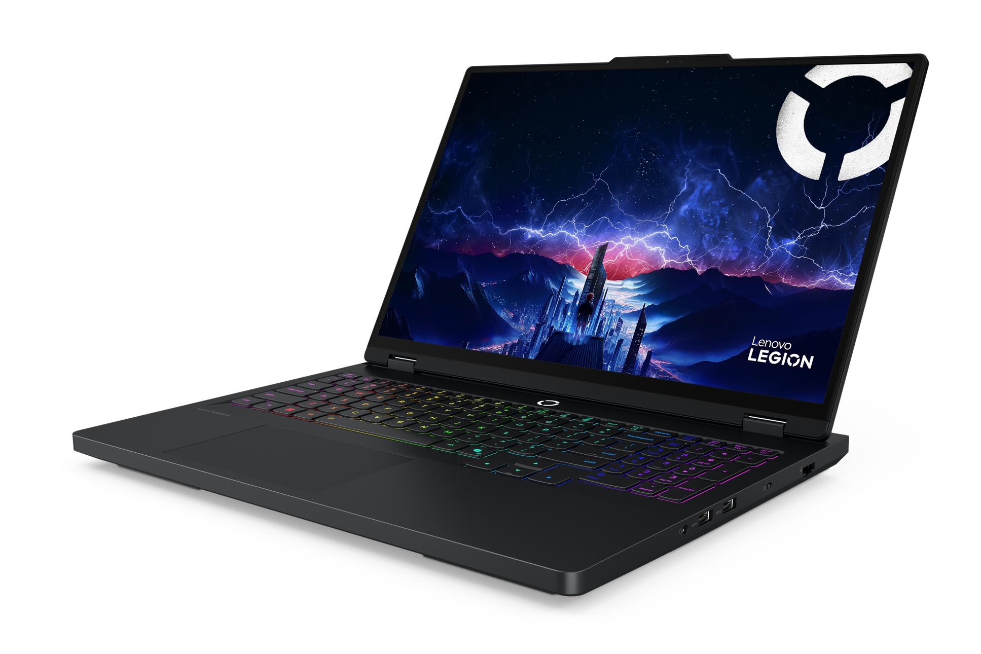 Czarny laptop Lenovo Legion z podświetlaną tęczowo klawiaturą, ekran wyświetla miasto z błyskawicami, białe logo i nazwę marki.