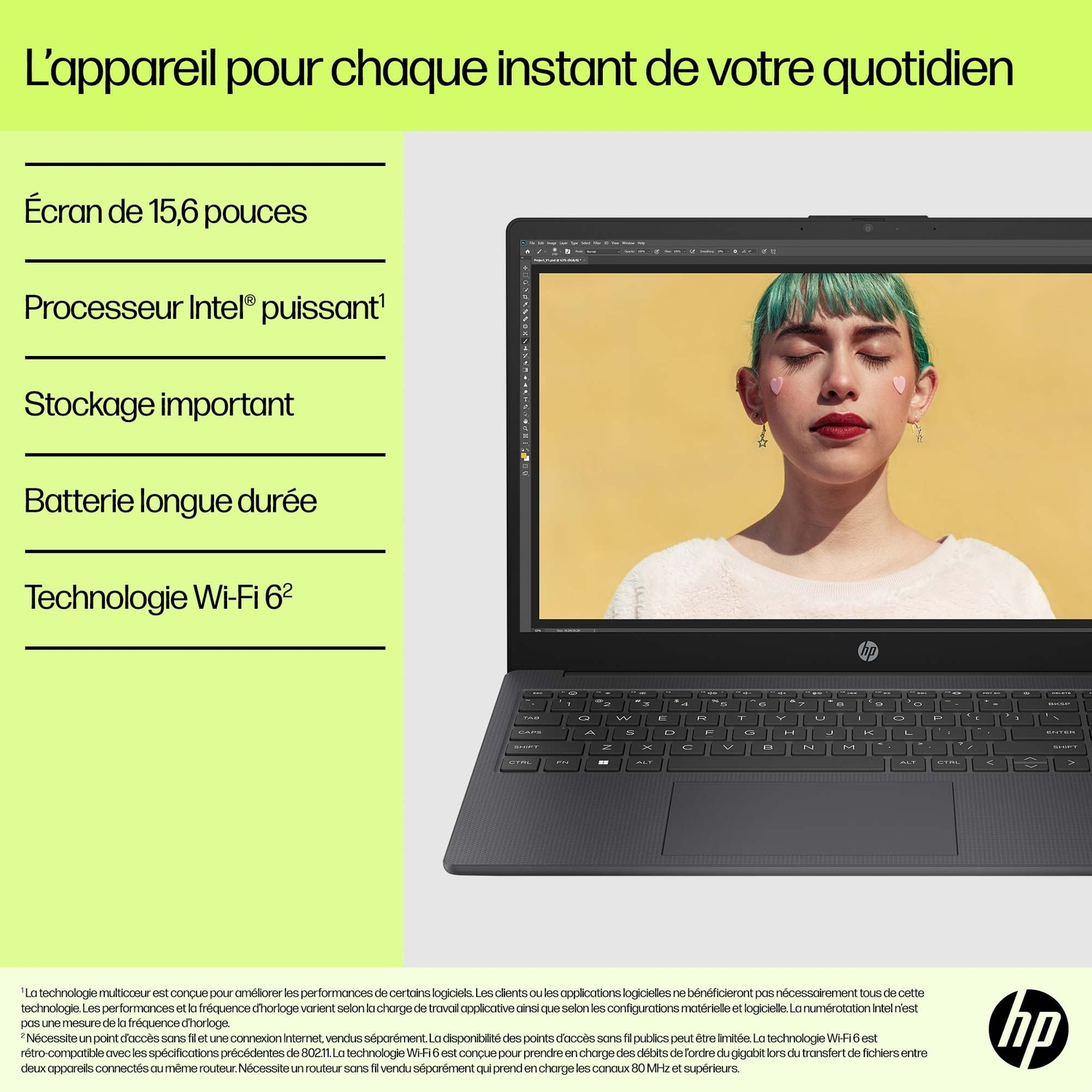 Ordinateur portable avec une personne sur l'écran. La personne a les cheveux verts et des autocollants en forme de cœur.