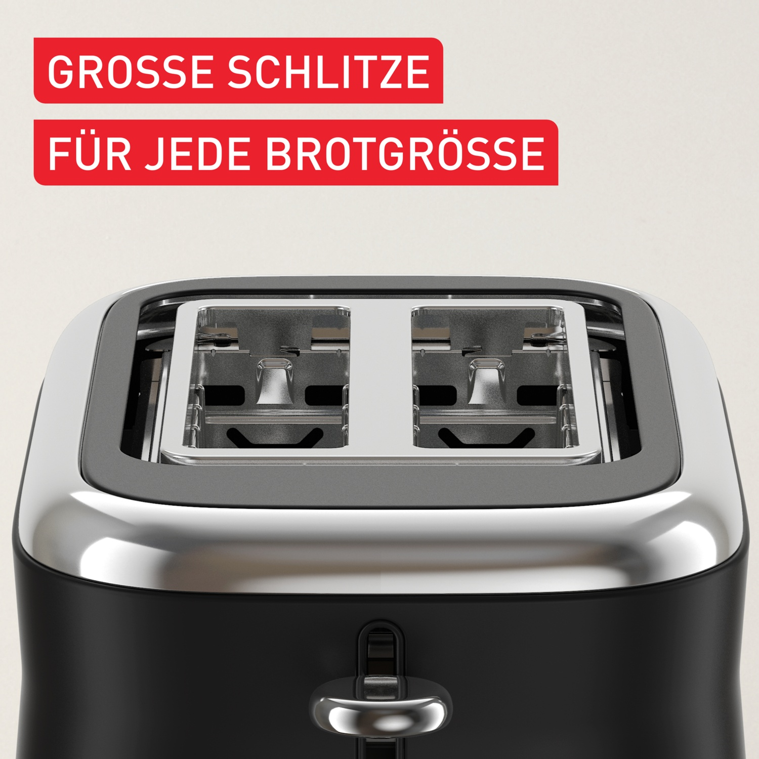 Close-up of a black and silver toaster. Red text at the top reads 'GROSSE SCHLITZE,' and below, 'FÜR JEDE BROTGRÖSSE'.
