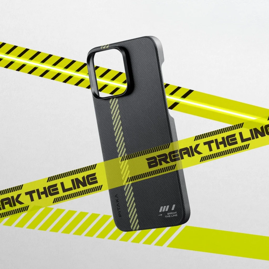 Fekete telefontok sárga csíkkal és veszélyszalaggal. A szöveg: 'Break the Line'. Fehér háttér.