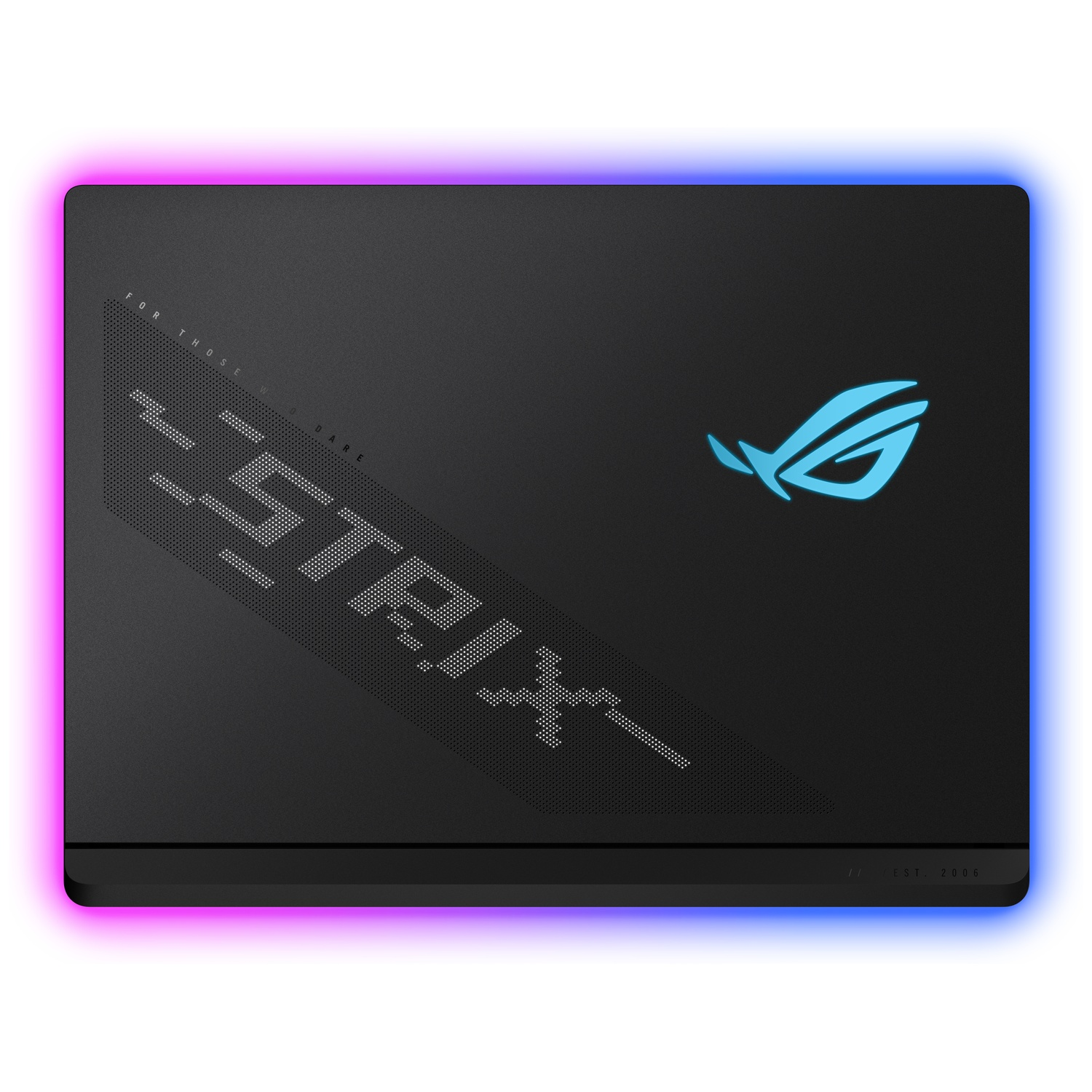 Black laptop with a glowing edge. The ROG logo and 'STRIX' are visible. Text reads 'FOR THOSE WHO DARE' and 'EST. 2006'.