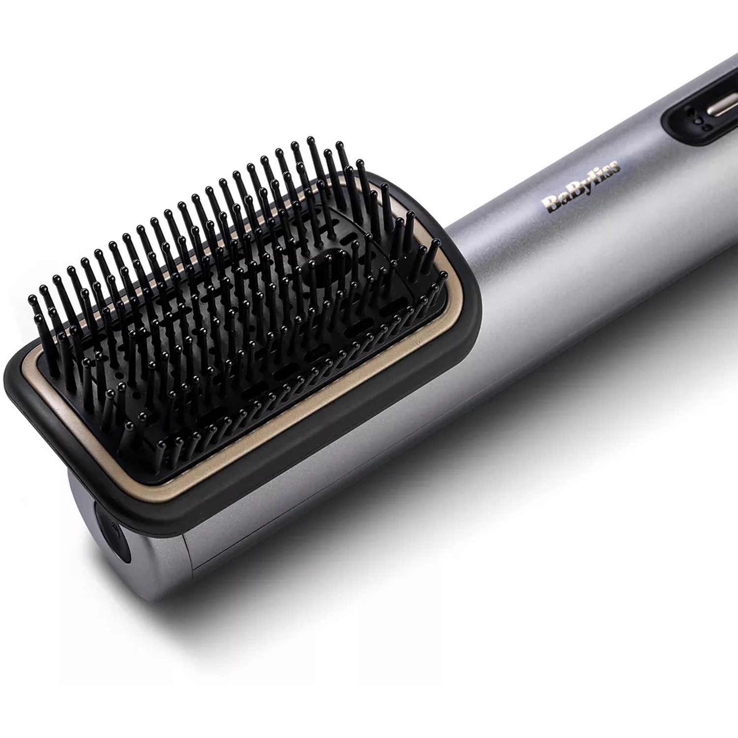 A silver and black hair straightening brush, brand name is Babyliss. The brush has black bristles on a rectangular head.