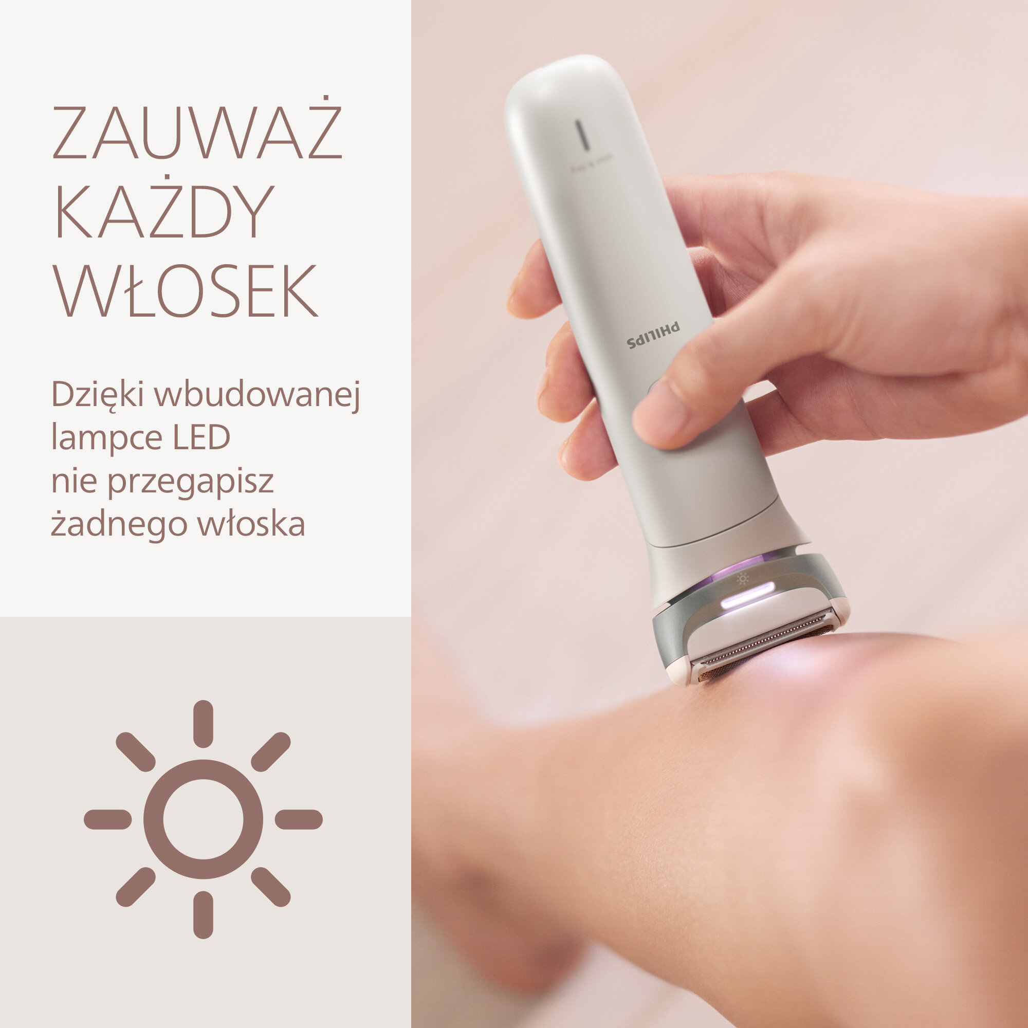 Osoba używa depilatora Philips na nodze. Urządzenie jest szare i białe.