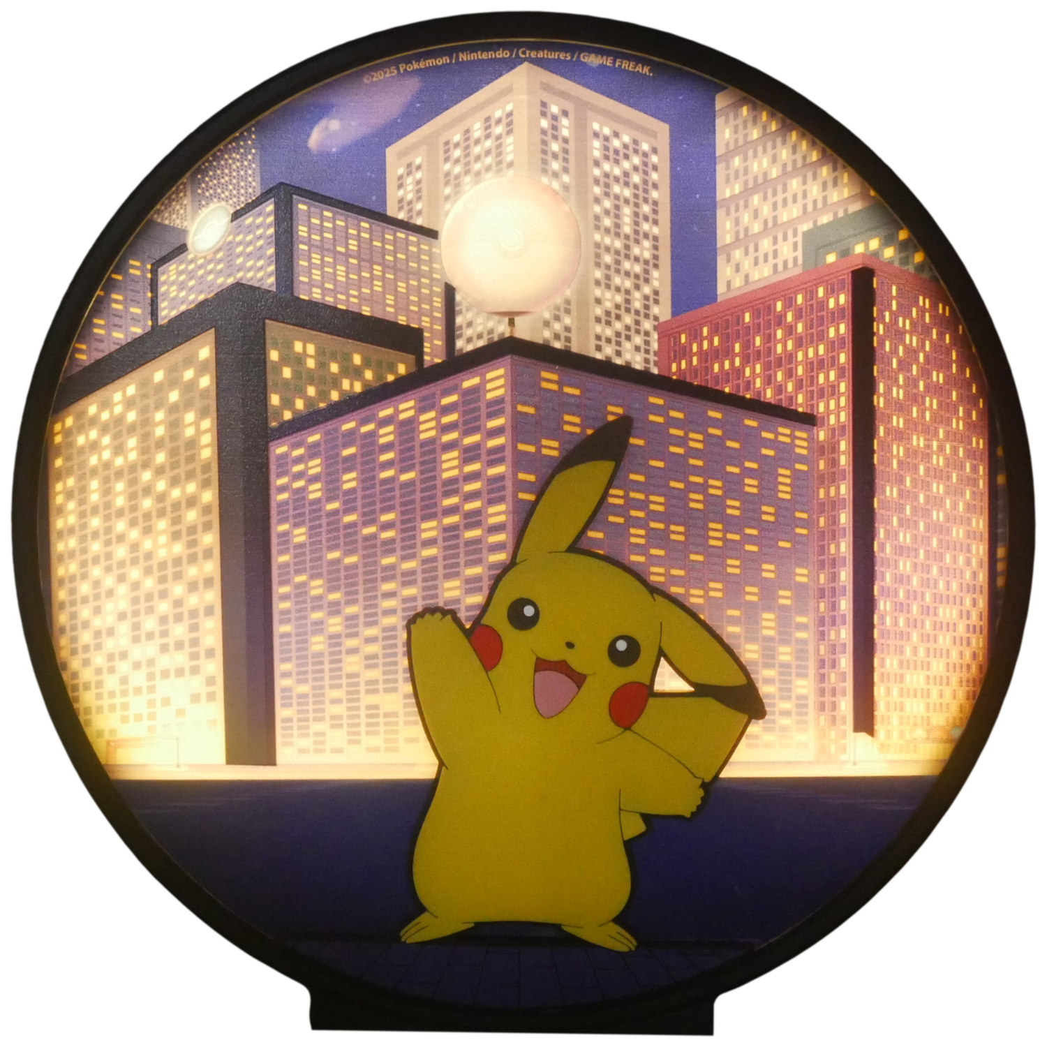 Pikachu in a city scene. Tall buildings with lit windows. A large, round object is above Pikachu. Black circular frame.
