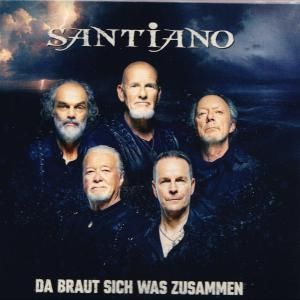 Fünf Männer in dunklen Hemden, Band Santiano, Titel 'Da Braut Sich Was Zusammen' vor stürmischem Himmel.