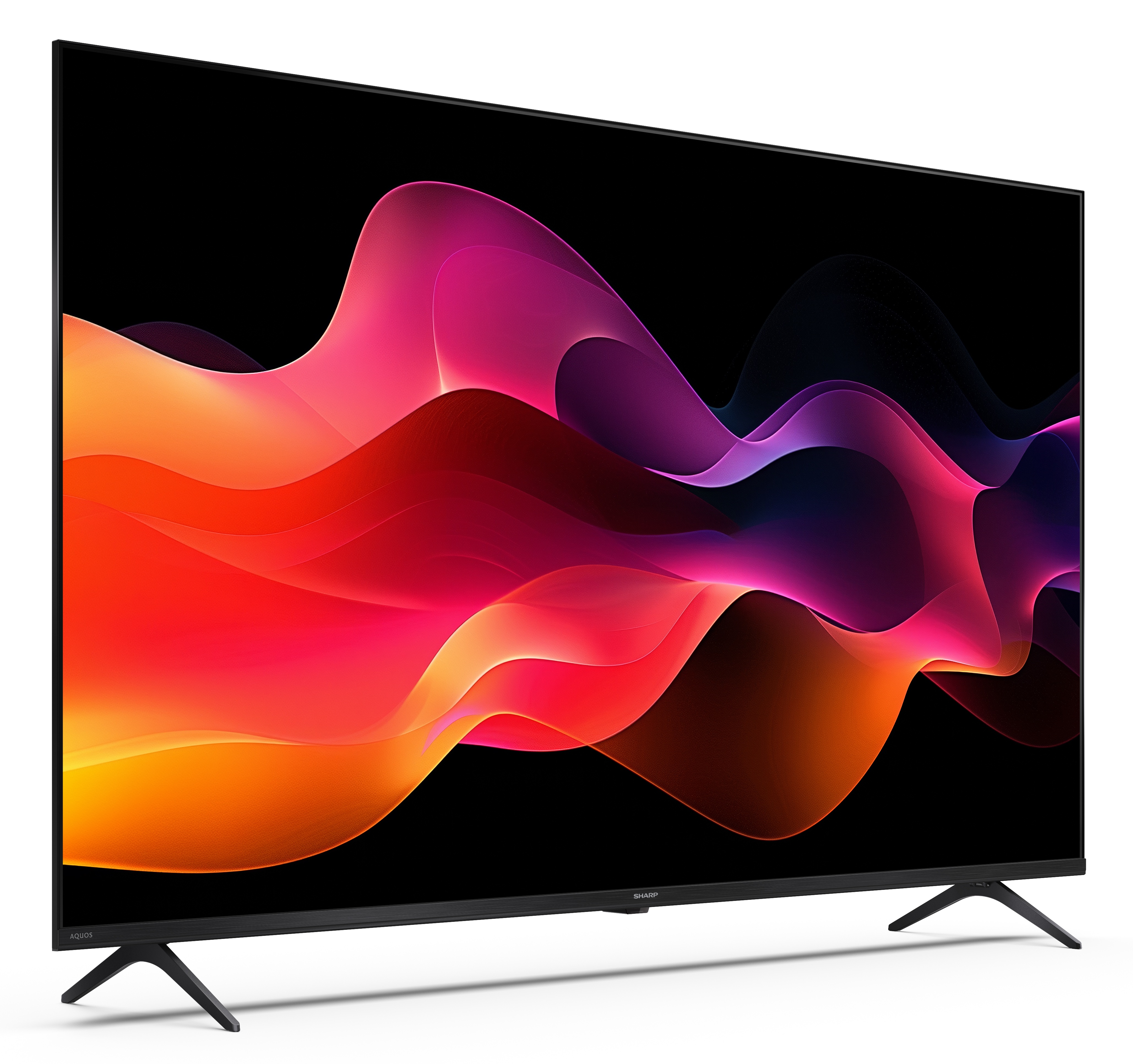 Duży telewizor z czarną ramą wyświetla kolorowe, abstrakcyjne, płynące kształty w kolorach pomarańczowym, czerwonym i fioletowym.