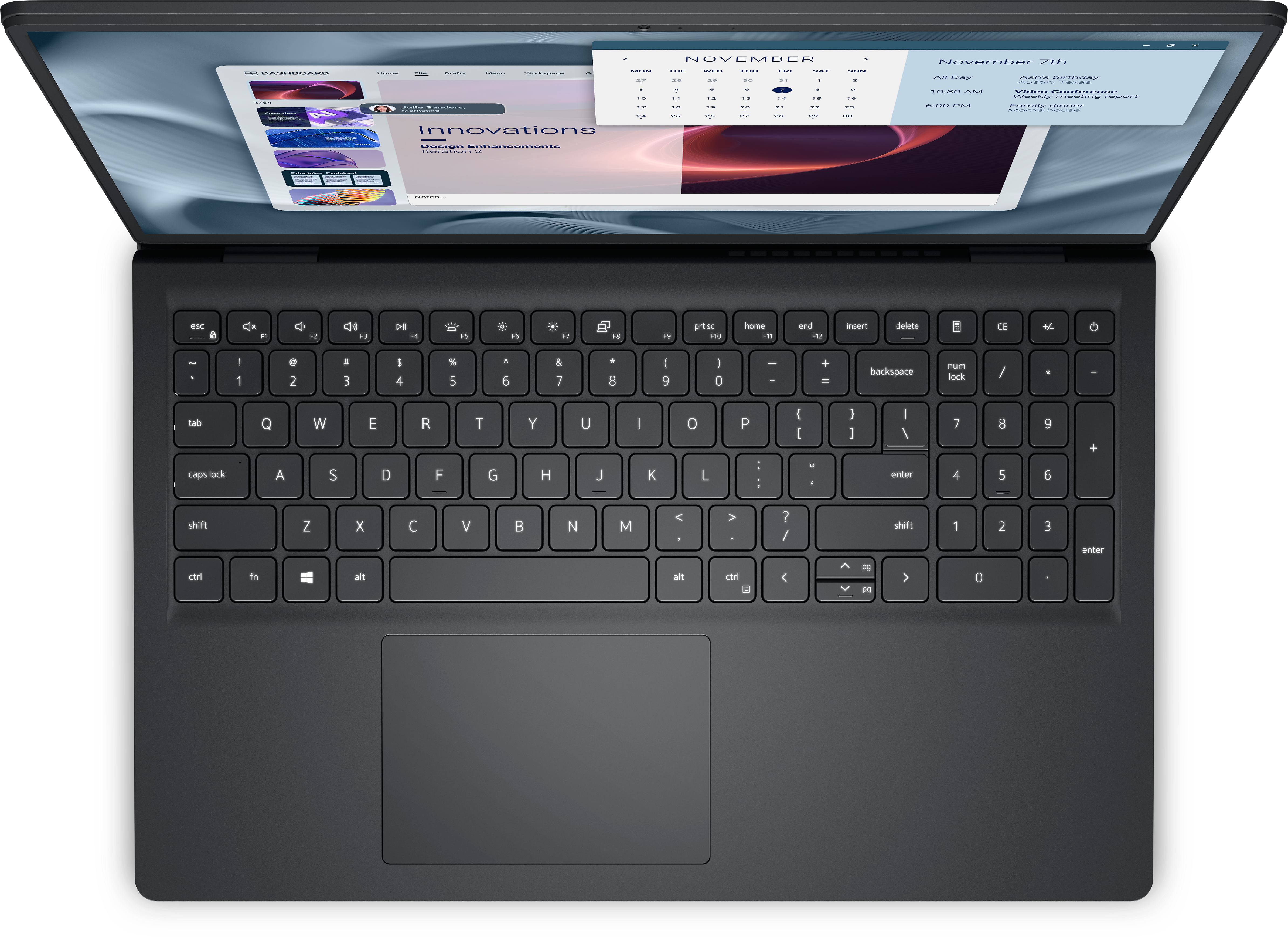 Laptop mit geöffnetem Bildschirm, der einen Kalender und eine Tastatur zeigt.