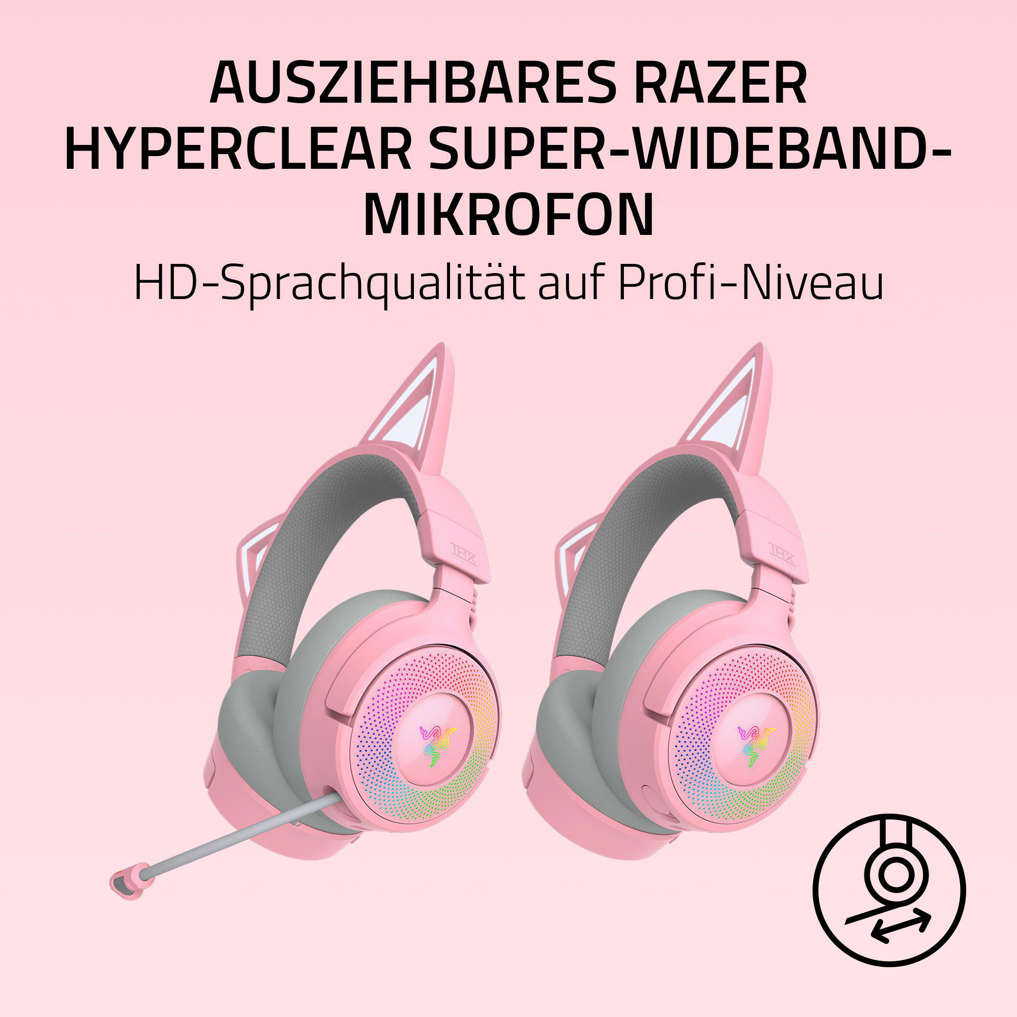 Rosa Razer-Kopfhörer mit Katzenohren. Graue Polsterung, ein Mikrofon und ein farbenfrohes Logo sind sichtbar. Text oben.