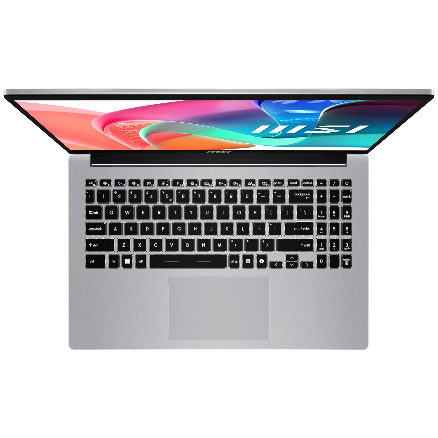 A silver laptop is open, displaying a colorful screen. The keyboard is visible, with a touchpad below. The MSI logo is on the screen.