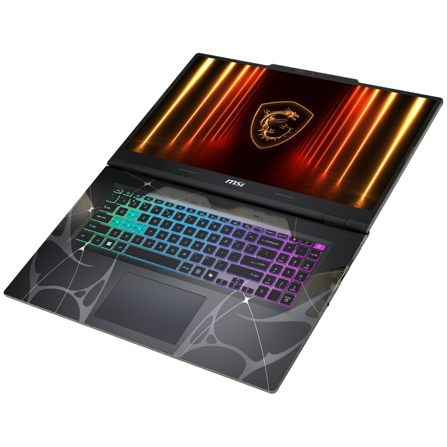 Open MSI laptop, keyboard with rainbow lights, spiderweb design, logo on screen, black frame, white background.