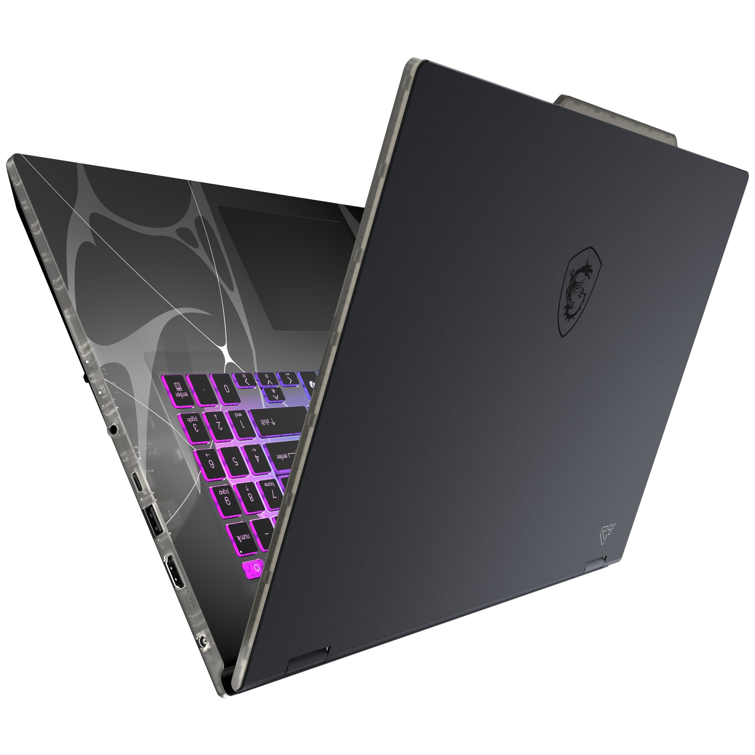 Open black laptop showing a lit keyboard. The screen shows a design. The back shows a logo and the letter P.