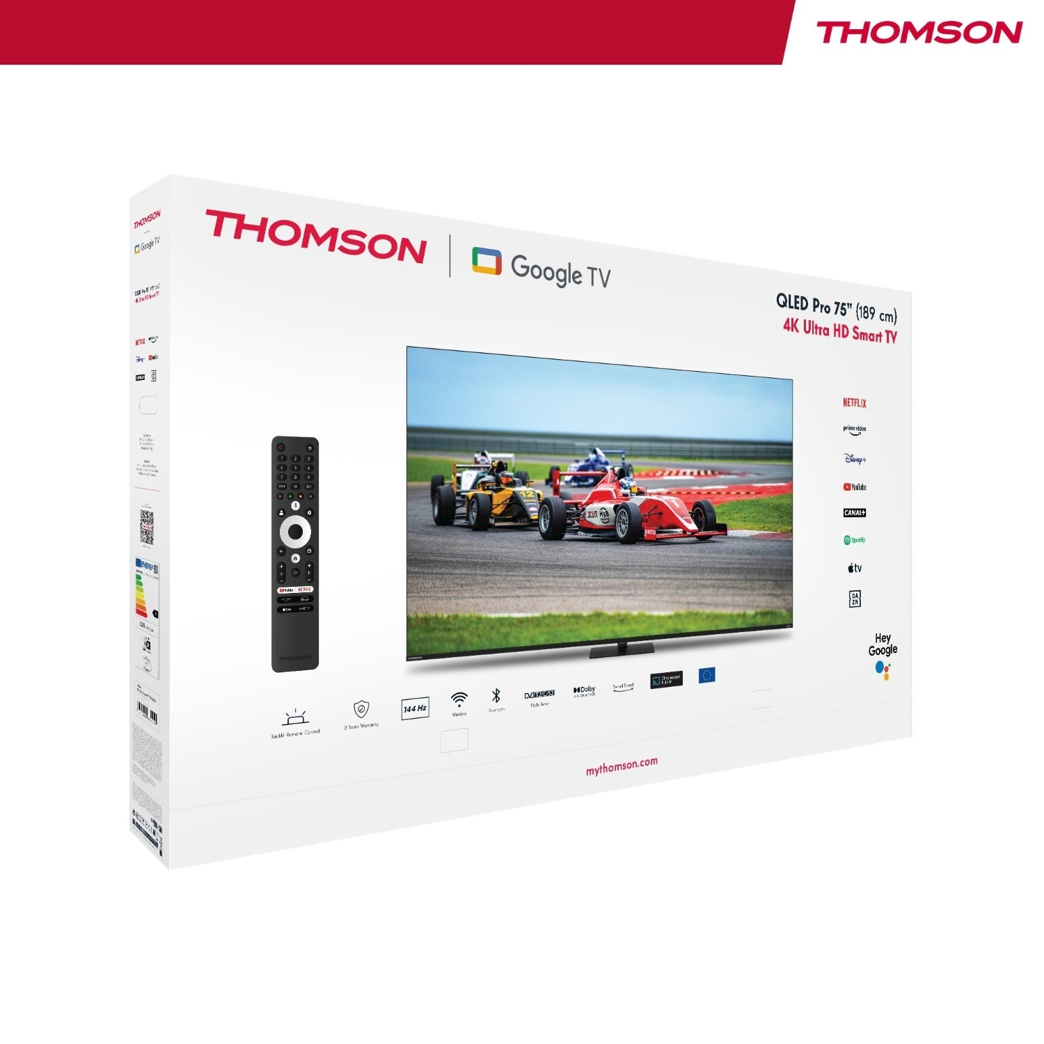 Scatola TV Thomson con telecomando. La TV mostra auto da corsa. Include Google TV, 4K e icone di app di streaming.
