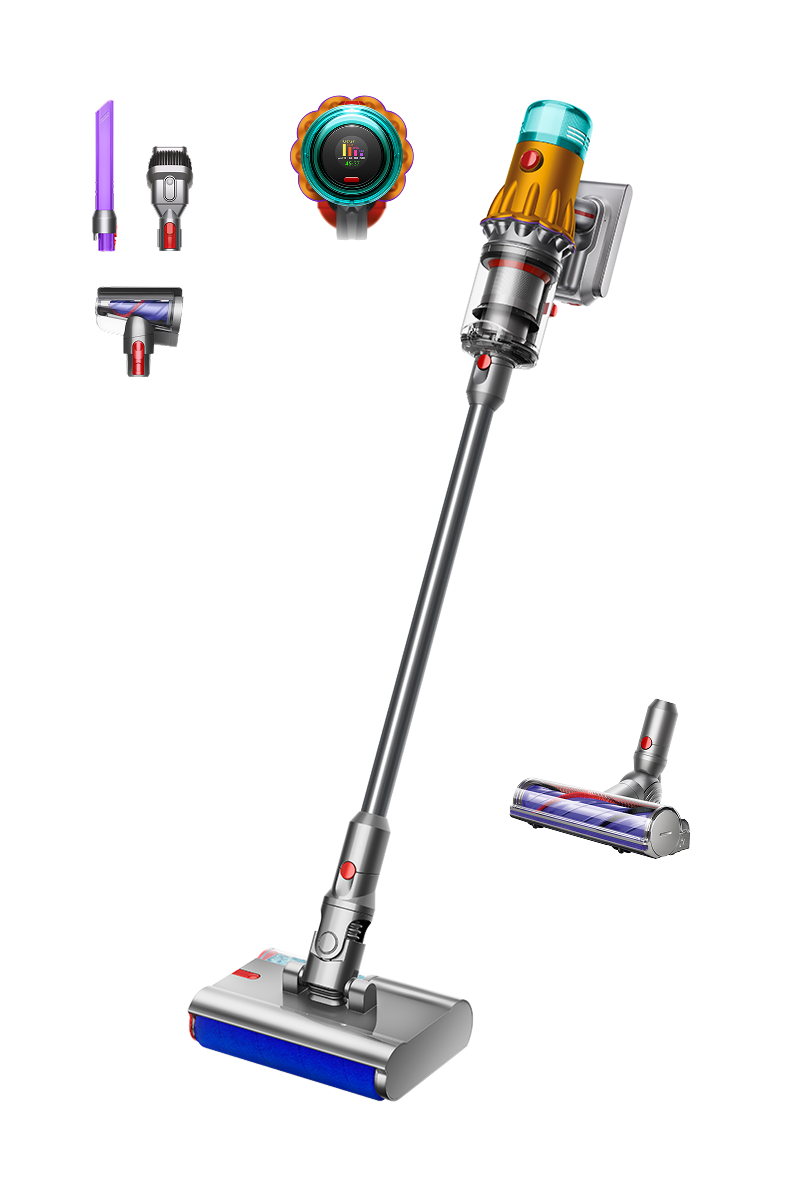 Una aspiradora Dyson con accesorios. La unidad principal es plateada y amarilla. Los accesorios incluyen varias boquillas y cepillos.