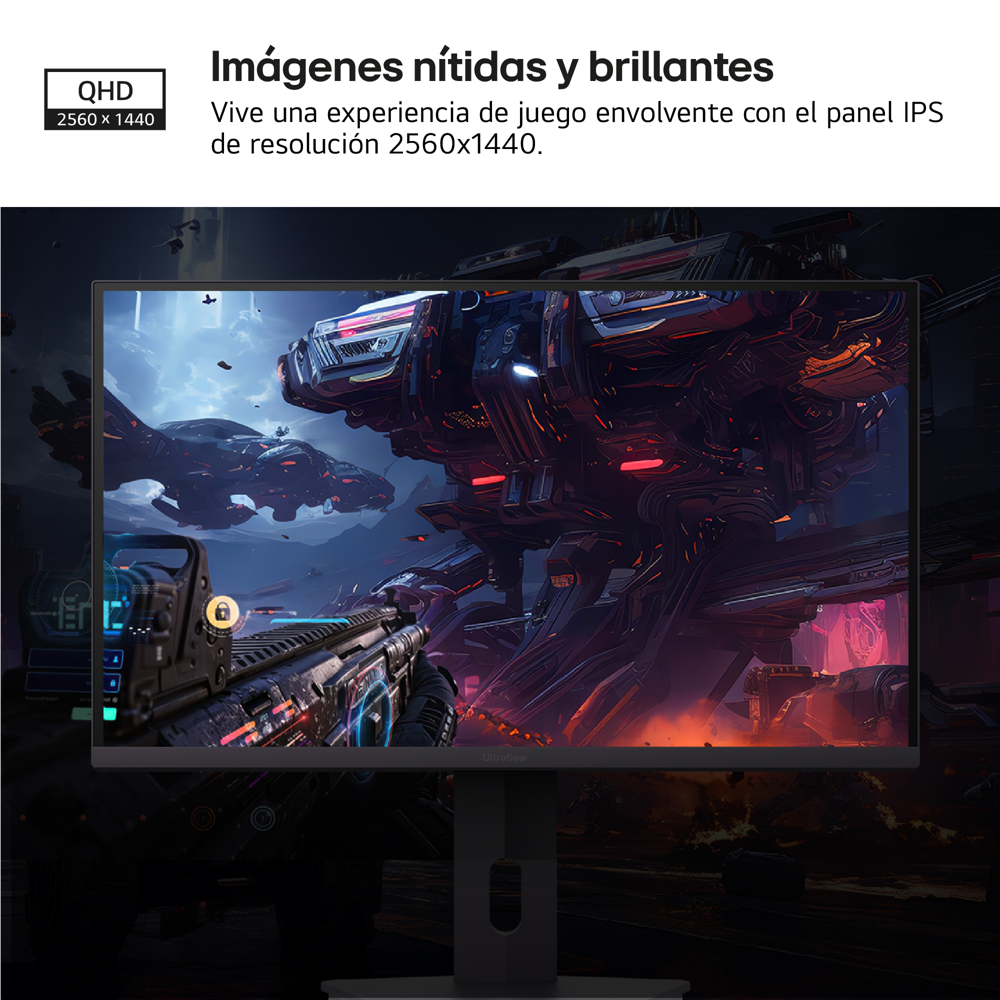 Monitor que muestra una escena de juego futurista. Un arma está en primer plano. Naves espaciales y una estructura iluminada en rojo en el fondo.