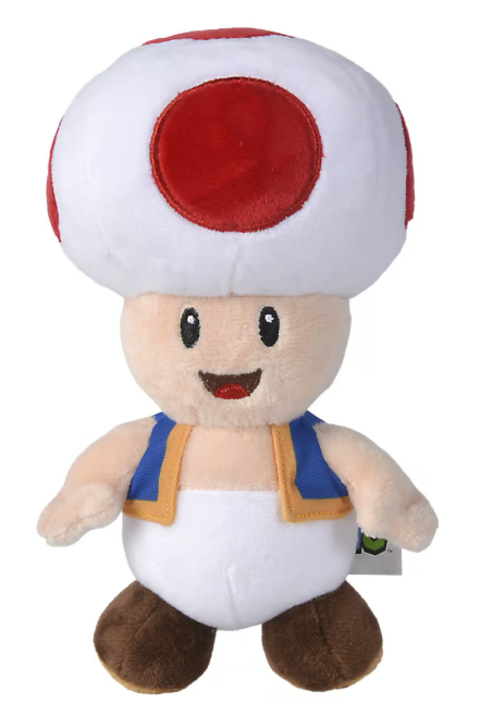 Ein Stofftier von Toad, einer Figur aus Mario. Es hat einen weißen Pilzkopf mit roten Punkten, ein beiges Gesicht und eine blaue Weste.