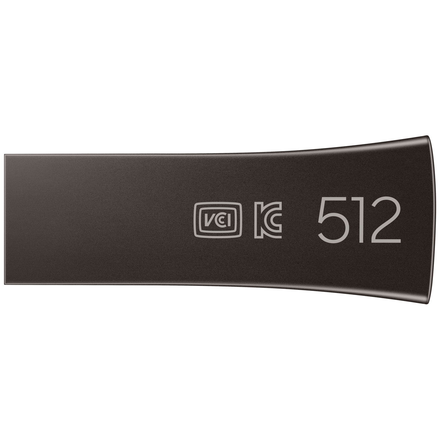 A dark gray USB flash drive with the text "VCI KC 512" printed on it. The background is white.