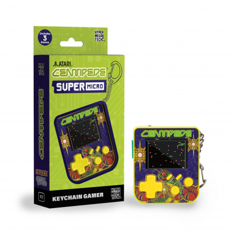 Un juego de llavero Centipede Super Micro se muestra junto a su caja. La caja y el juego son morados, amarillos y verdes.