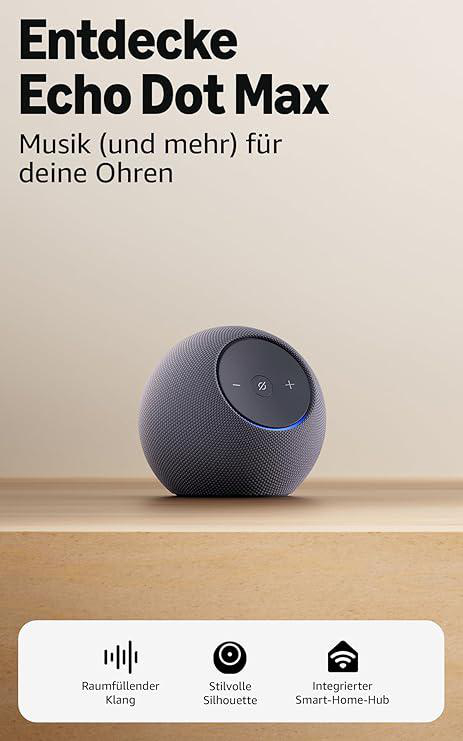 Ein Echo Dot Max-Lautsprecher steht auf einer Holzoberfläche. Der Text oben lautet 'Echo Dot Max'. Unten befinden sich Symbole.