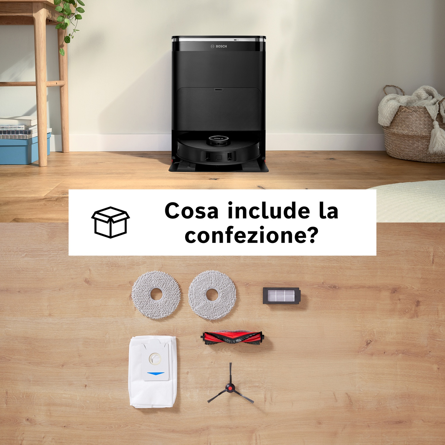 Un robot aspirapolvere con accessori su pavimento in legno. Include panni, spazzola, sacchetto polvere e filtro.