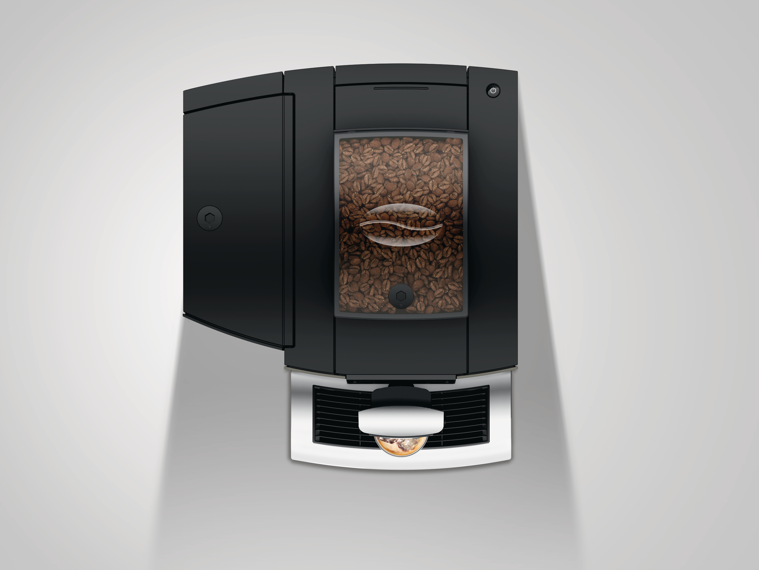 Draufsicht auf eine schwarz-silberne Kaffeemaschine. Die Maschine hat einen Bohnenbehälter mit Kaffeebohnen.