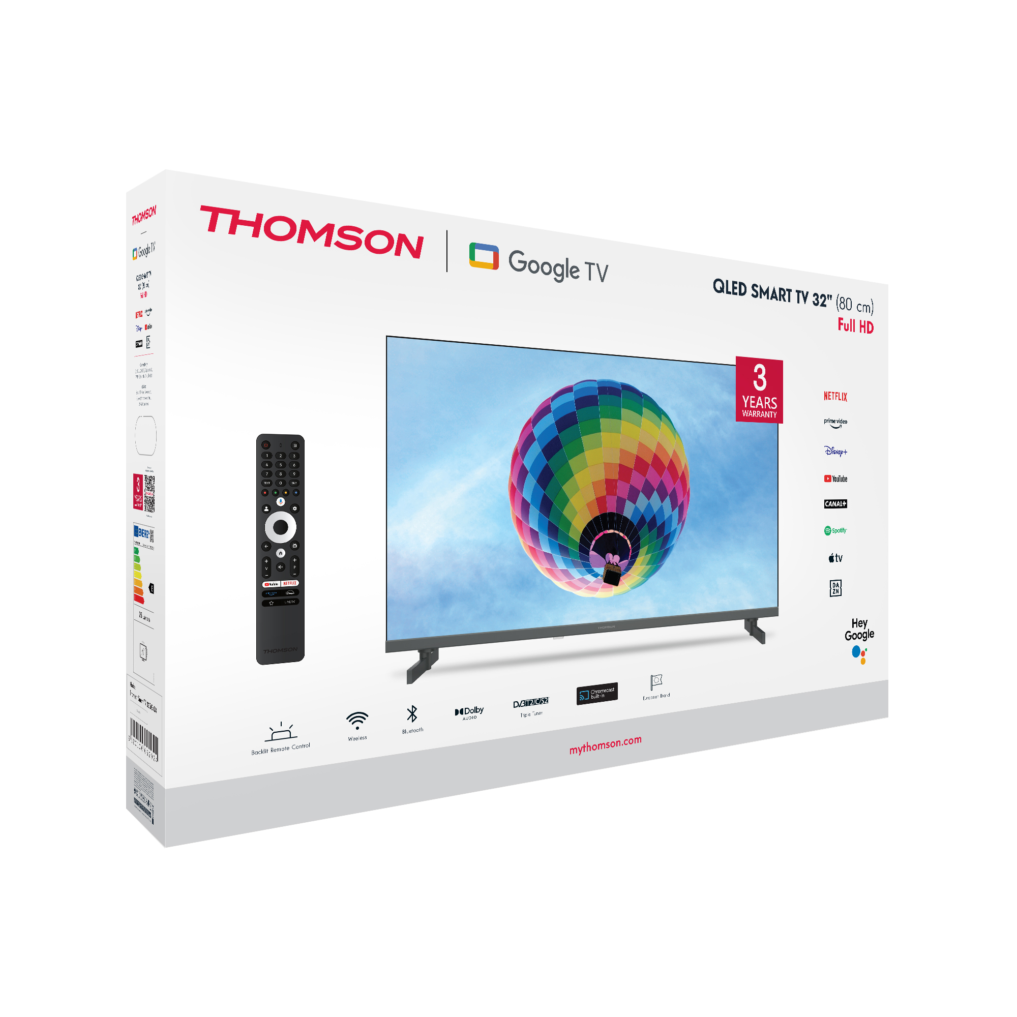 Egy Thomson QLED Smart TV 32" doboz. A TV-t mutatja, színes hőlégballonnal a képernyőn és egy távirányítóval.
