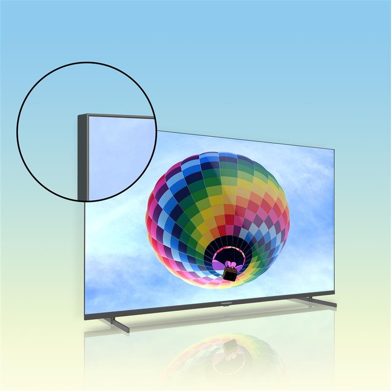 A TV egy színes hőlégballont jelenít meg kék égbolttal. Egy kör kiemeli a TV vékony keretét.