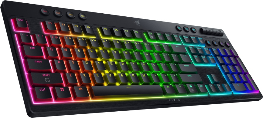 Una tastiera nera con tasti color arcobaleno e una cornice nera. La tastiera ha vari tasti funzione e un logo Razer.