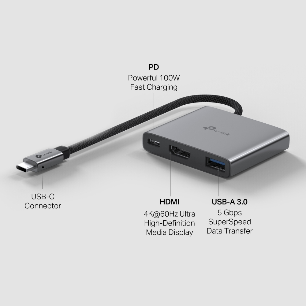 HDMI ve USB-A portlarına sahip gümüş renkli bir USB-C hub. Bir USB-C konektörü ve bir kabloya sahip. Metin etiketleri özelliklerini açıklıyor.