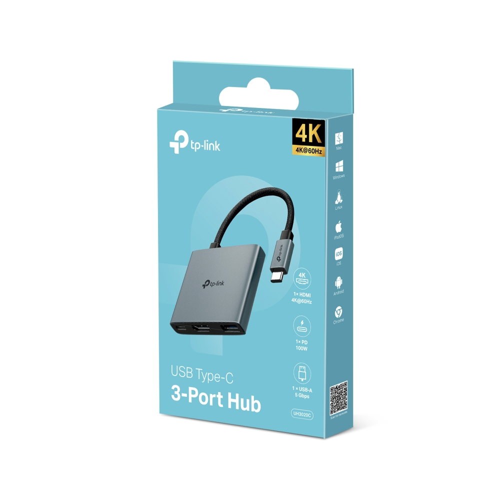 Kutusunda bir TP-Link USB Type-C 3 Port Hub. Gri renkte, siyah bir kabloya sahip. Kutu açık mavi ve beyaz.