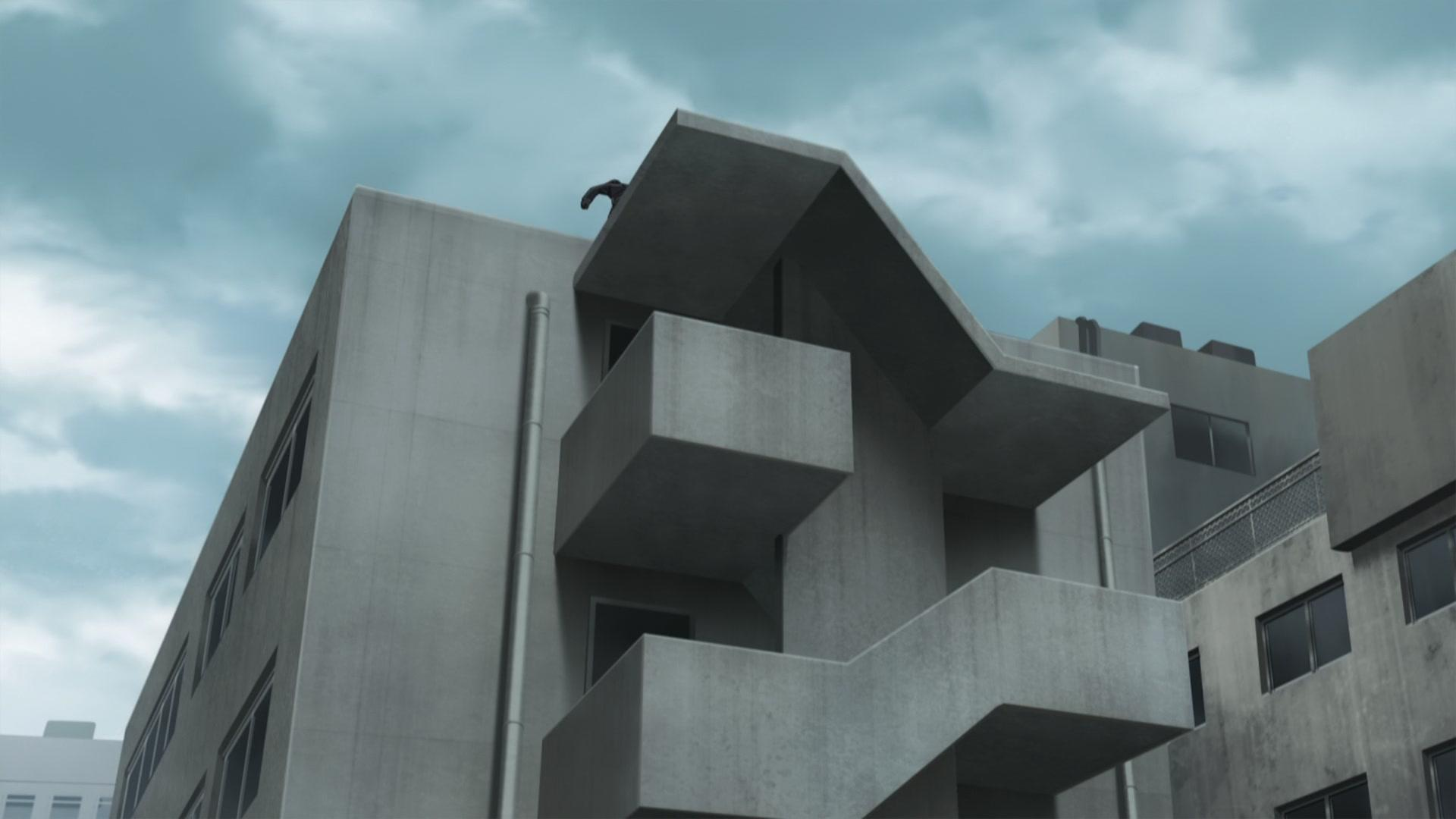 Betongebäude mit geometrischen Formen und einer Figur auf dem Dach unter bewölktem Himmel.