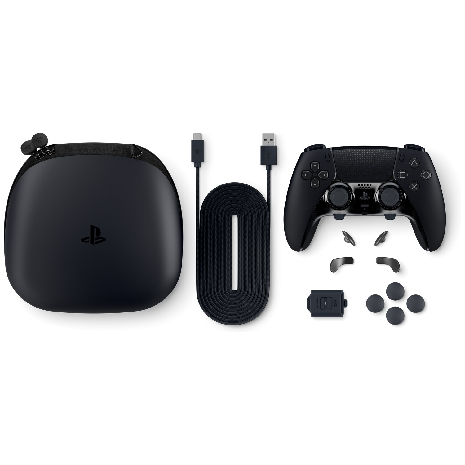 Black Playstation controller, case, cable, and accessories arranged on a white background. Components include a controller, cable, and case.