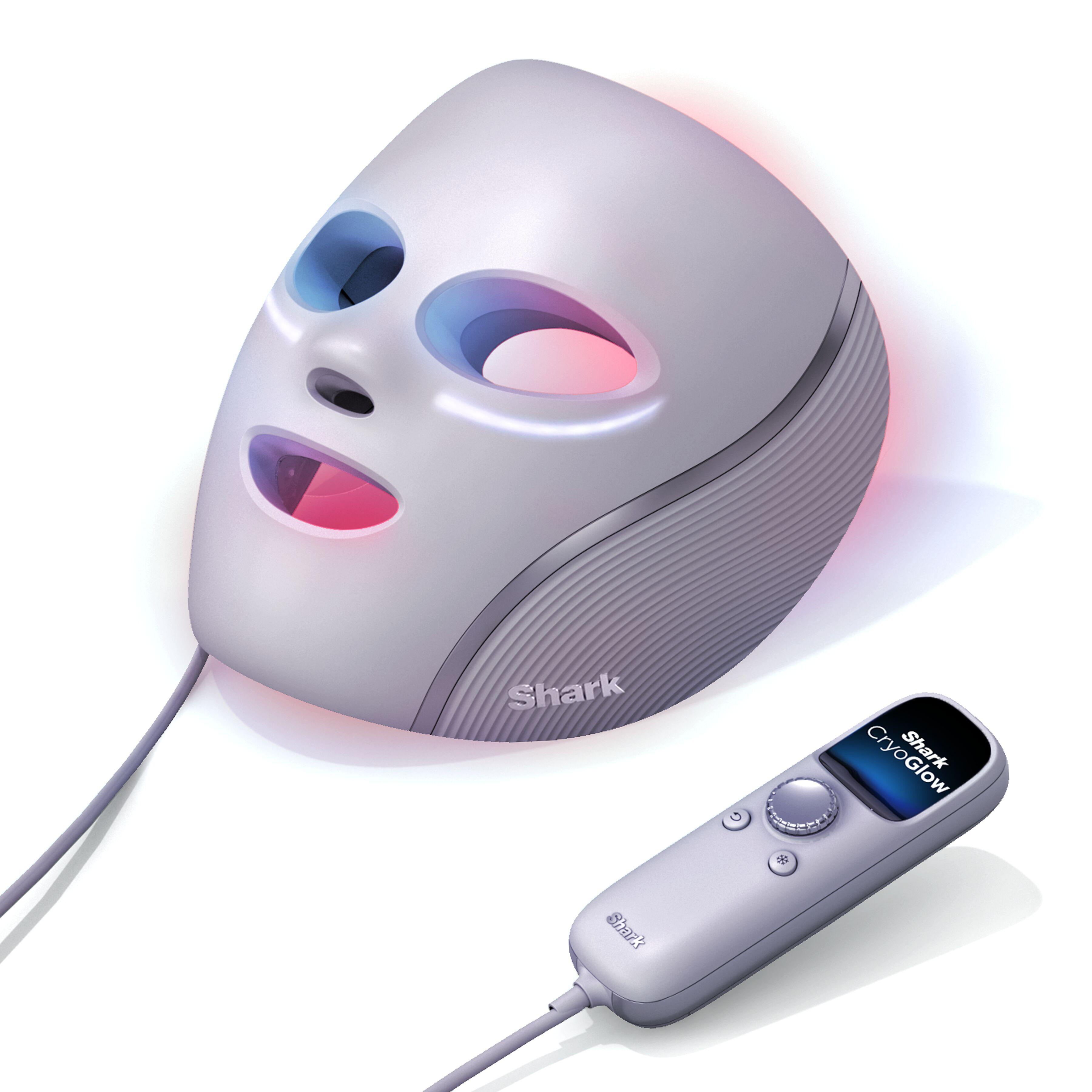 Eine Shark CryoGlow Gesichtsmaske und Fernbedienung auf weißem Hintergrund. Die Maske hat blaue und rote Lichter.