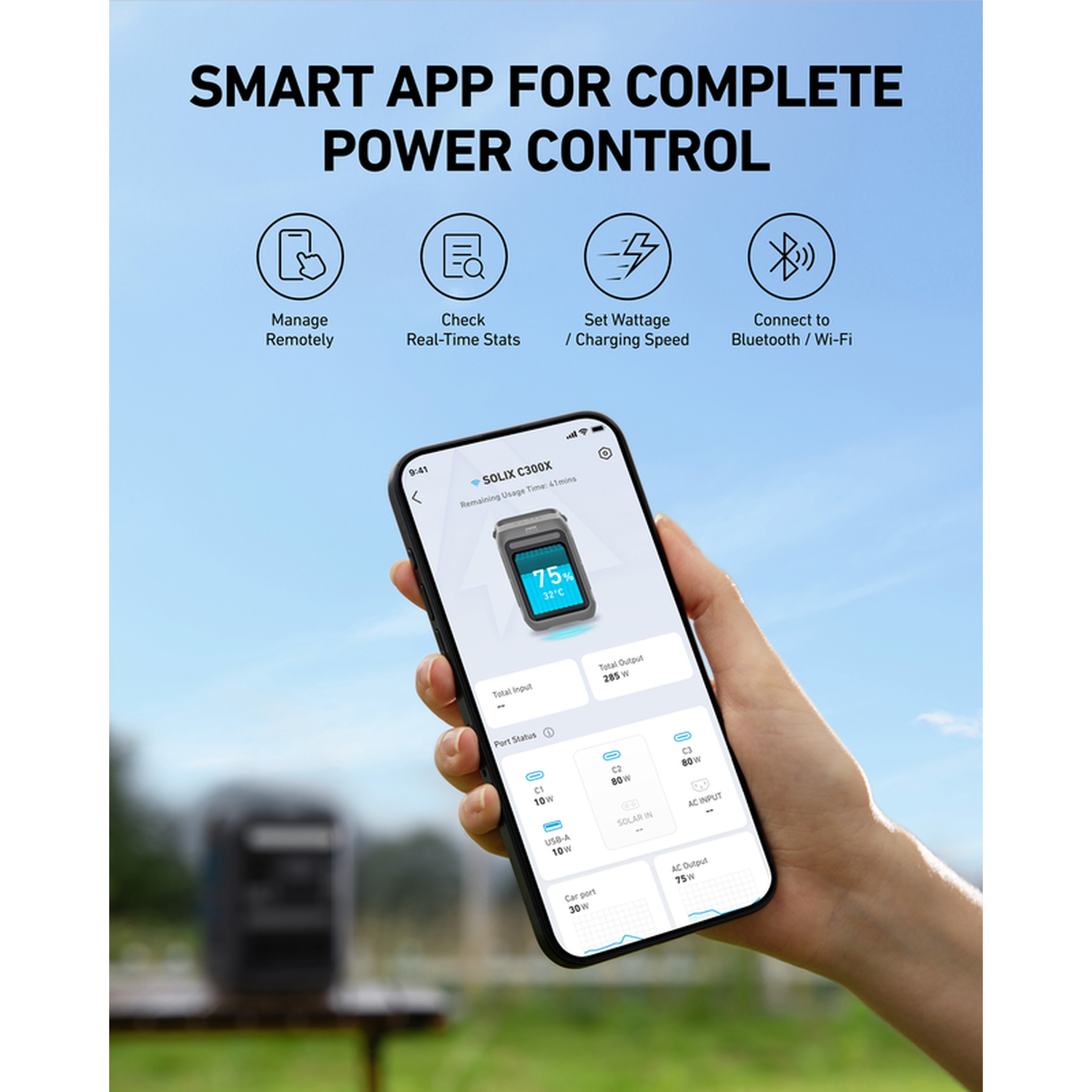 A hand holds a phone showing app interface. The screen displays power usage stats. The background is a blue sky.