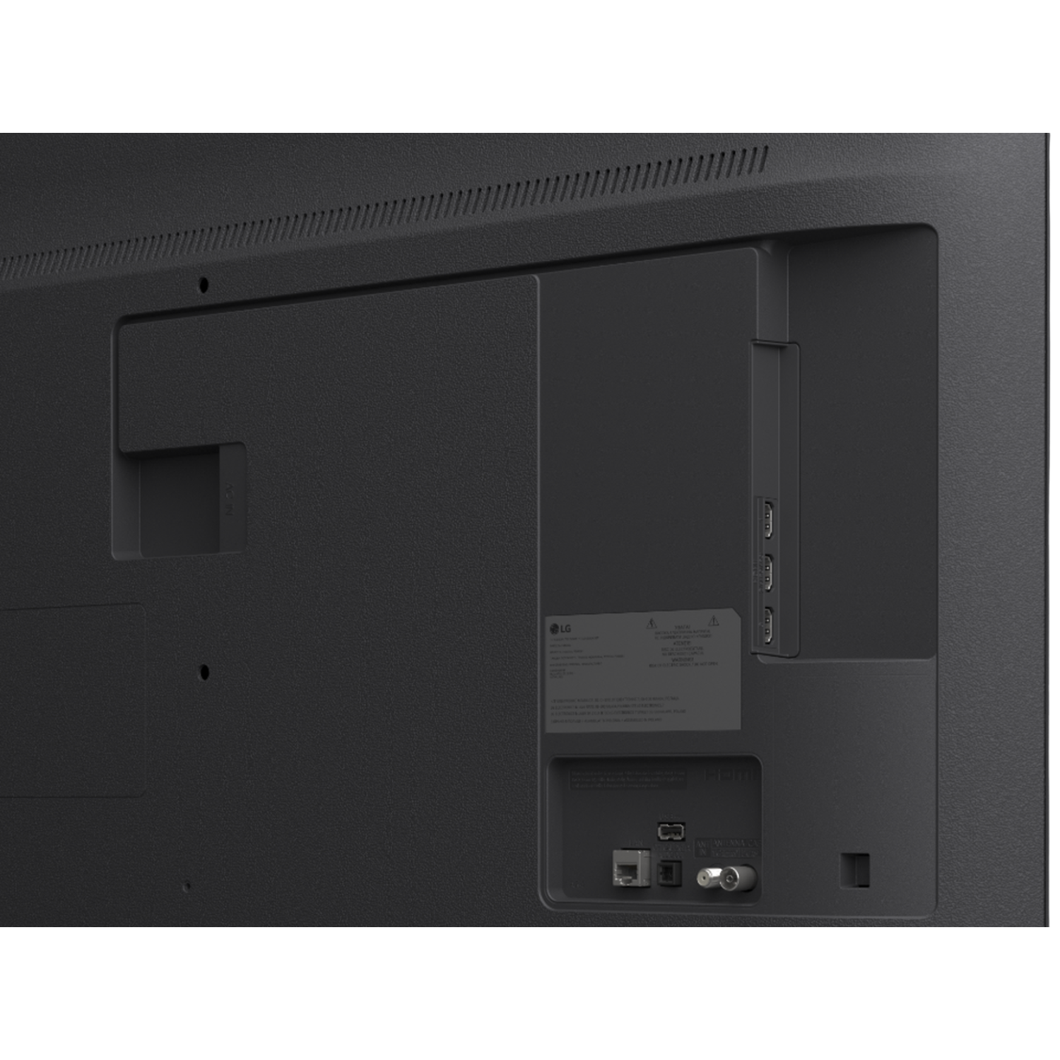 The back of a black LG TV. Ports, labels, and vents are visible. HDMI ports, ethernet, and a coaxial cable port are present.
