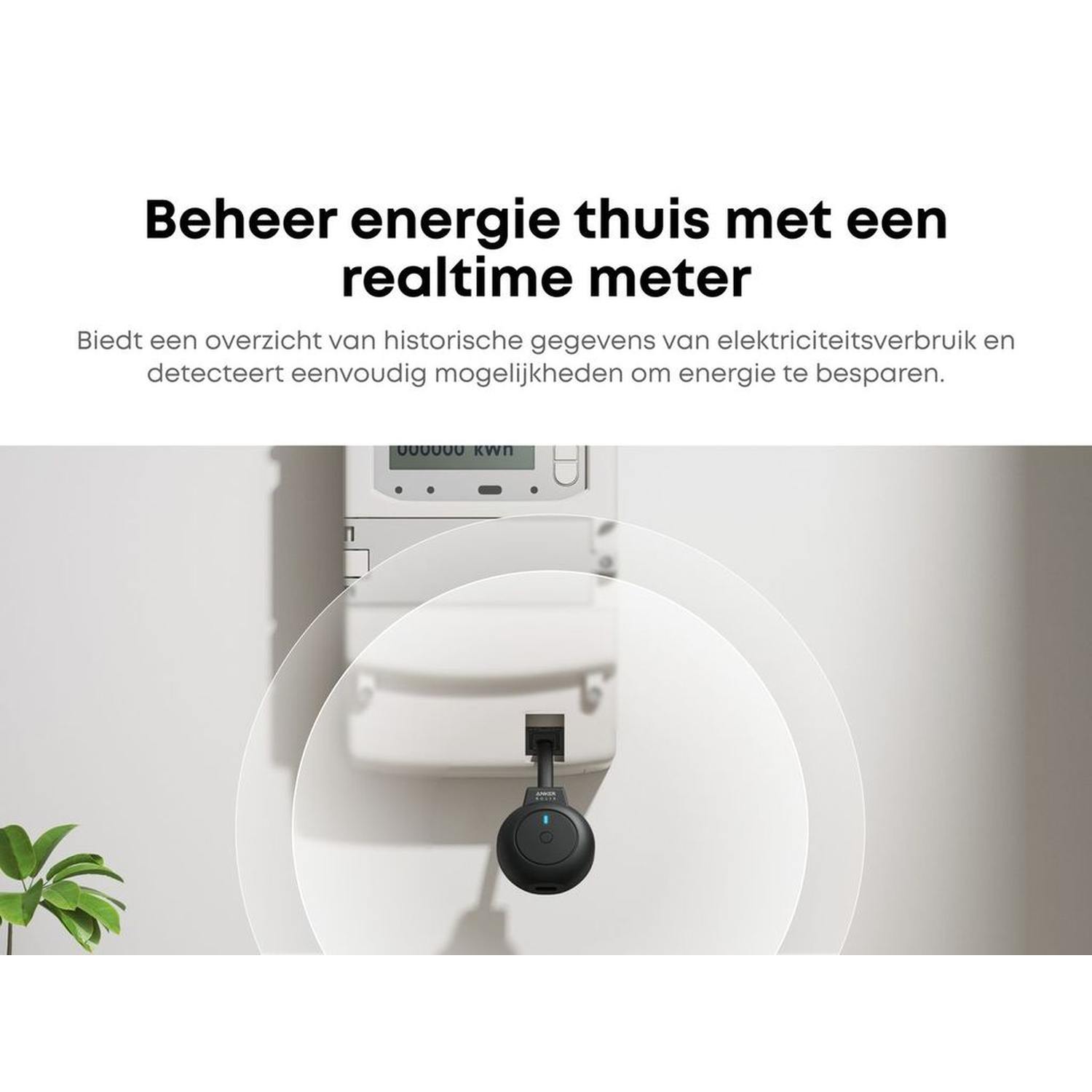A black device is attached to a white electric meter. Text above reads, manage energy at home with a real-time meter.