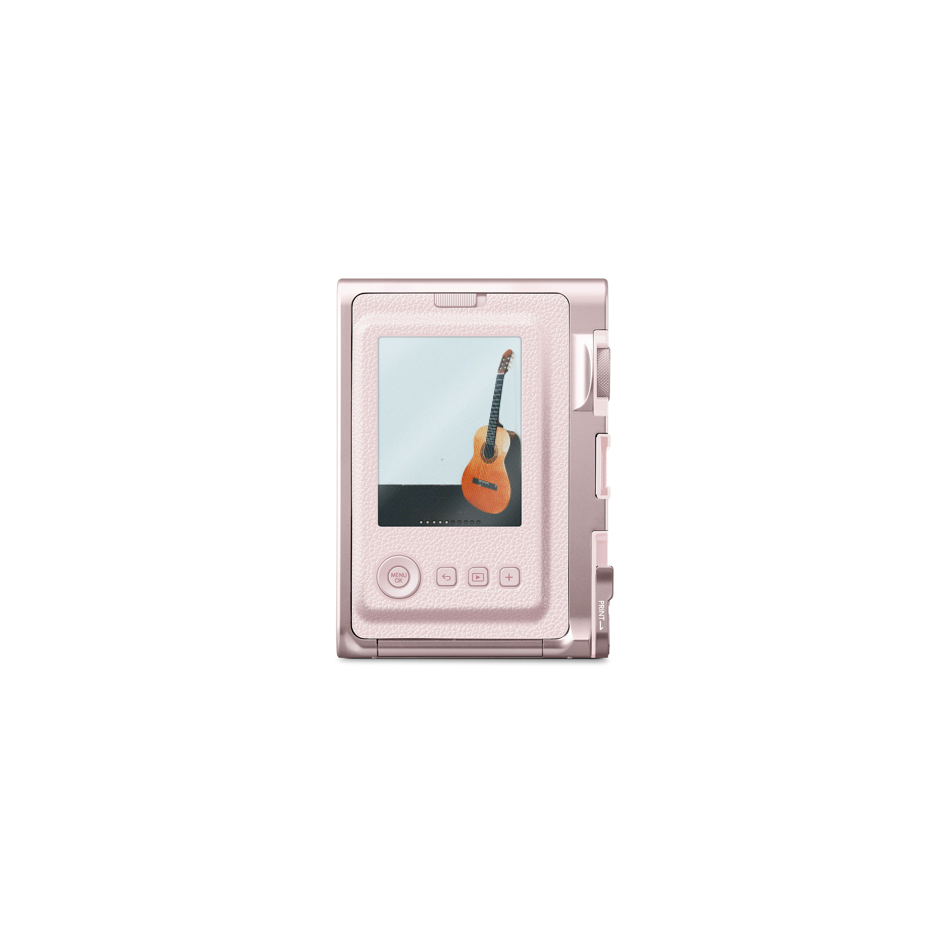 Eine rosa Sofortbildkamera zeigt ein Gitarrenbild. Die Kamera hat Knöpfe und steht vor weißem Hintergrund.