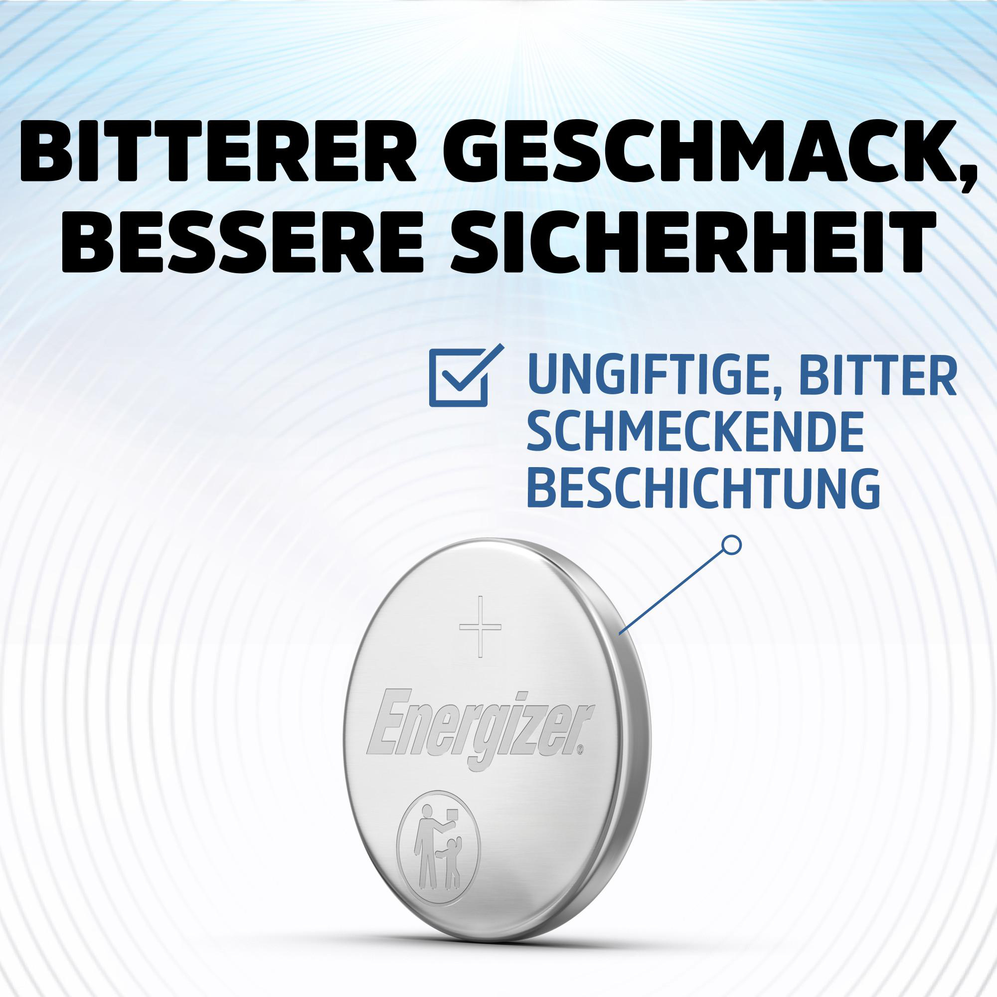 Das Bild zeigt eine Knopfzelle mit dem Energizer-Logo. Text sagt 'Bitterer Geschmack, bessere Sicherheit'.